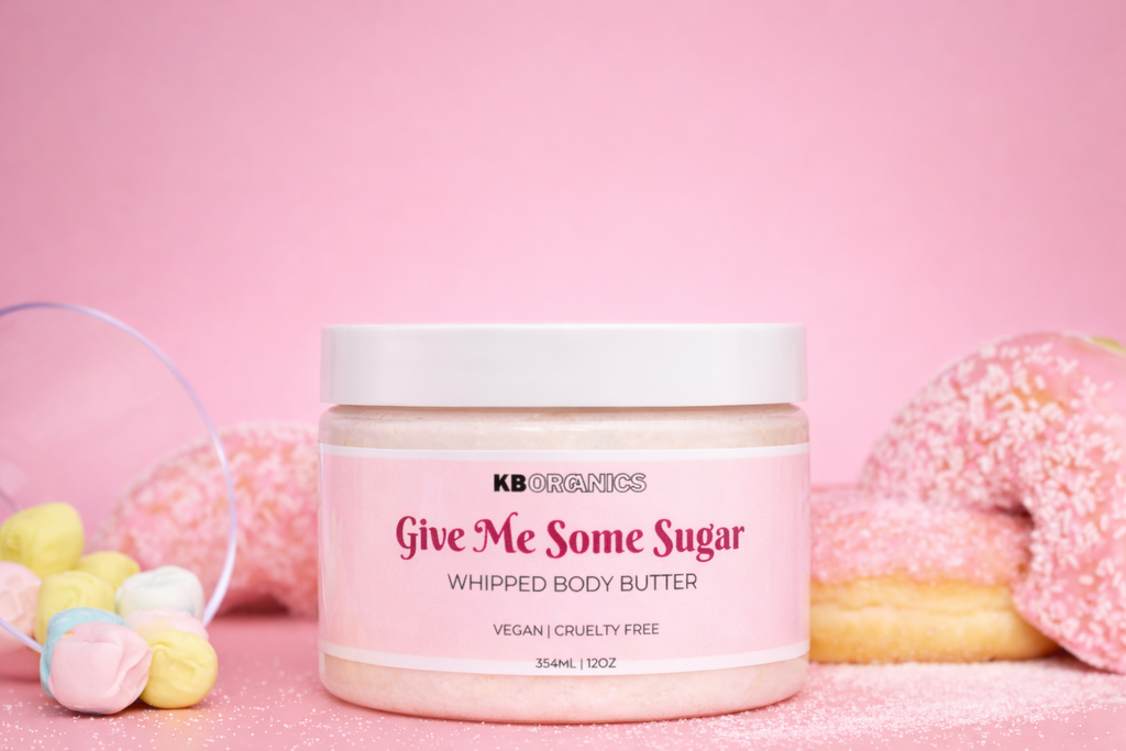 Jar of 'Give Me Some Sugar' whipped body butter with a pink background